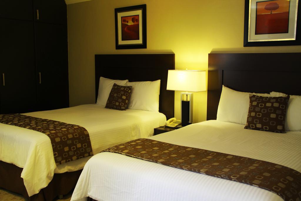 Aparthotel Sevilla Suites Panama Stadt Zimmer foto