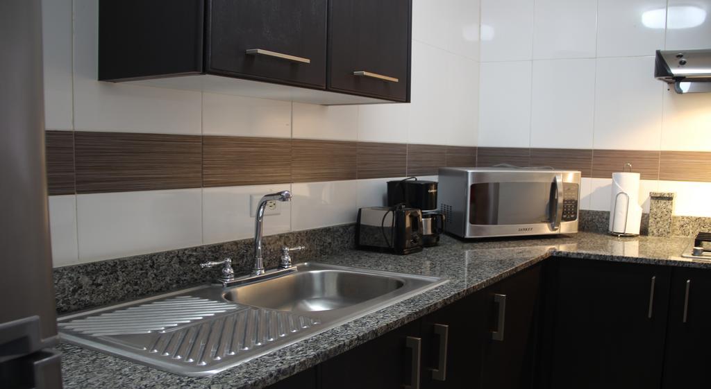 Aparthotel Sevilla Suites Panama Stadt Zimmer foto